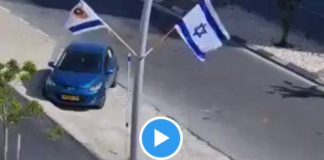 Des juifs opposés au sionisme arrachent le drapeau israélien - VIDEO