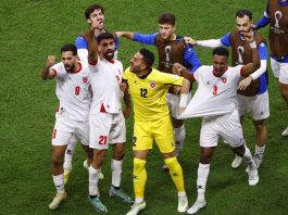 L’équipe nationale de football de Jordanie célébrant le victoire face à l'Arabie Saoudite.