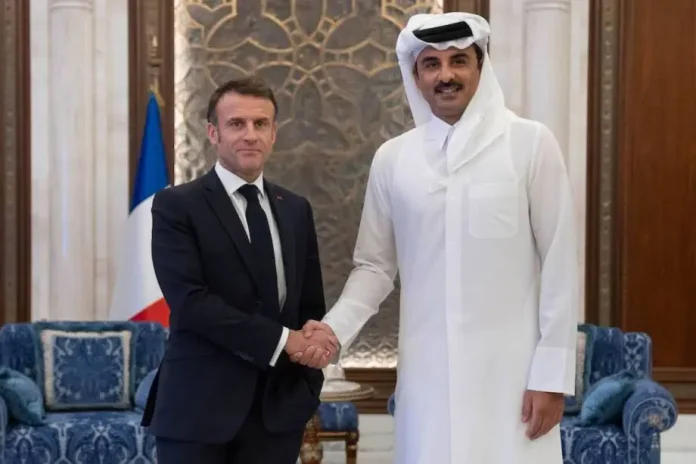 AA-20231203-33089205-33089203-EMMANUEL_MACRON_TAMIM_BIN_HAMAD_AL_THANI_MEETING_IN_DOHA____-1-1